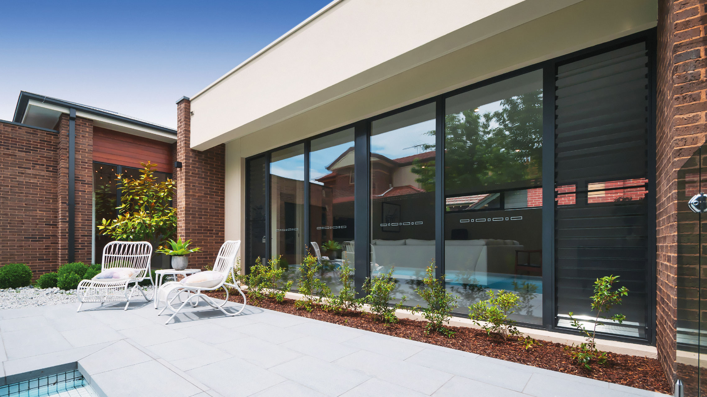 Aluminium Fixed Windows next to louvre windows