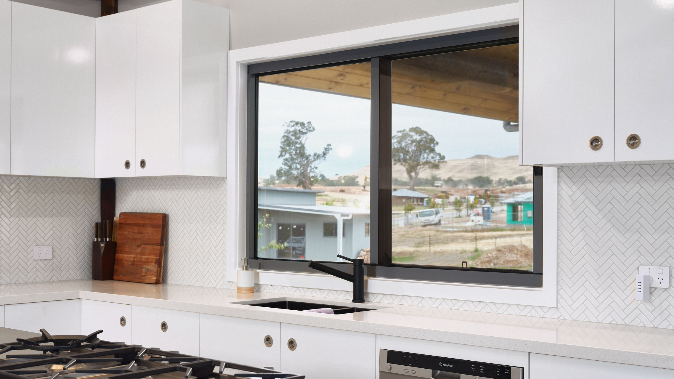 Aluminium Sliding Window above kitchen bench