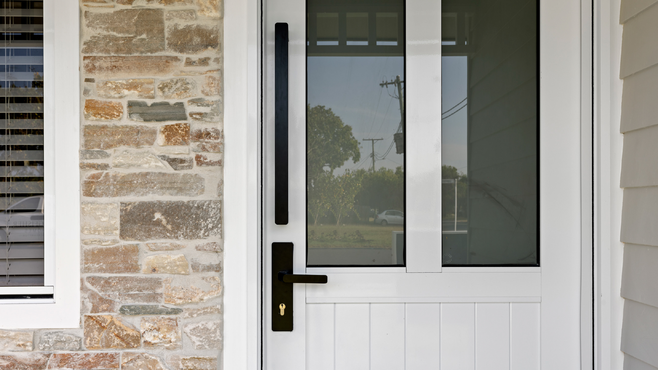 Close up of White Aluminium Front Entrance Door