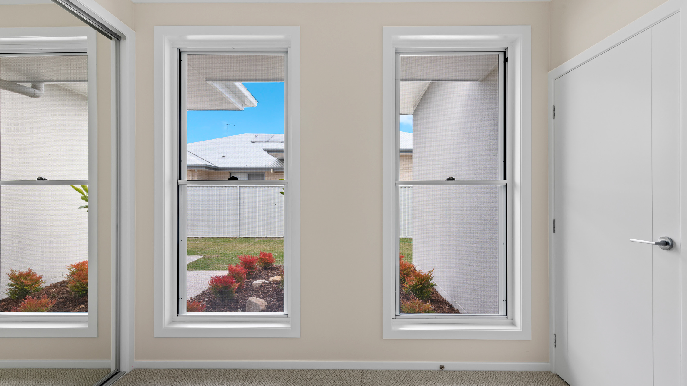 Two White Double Hung Windows