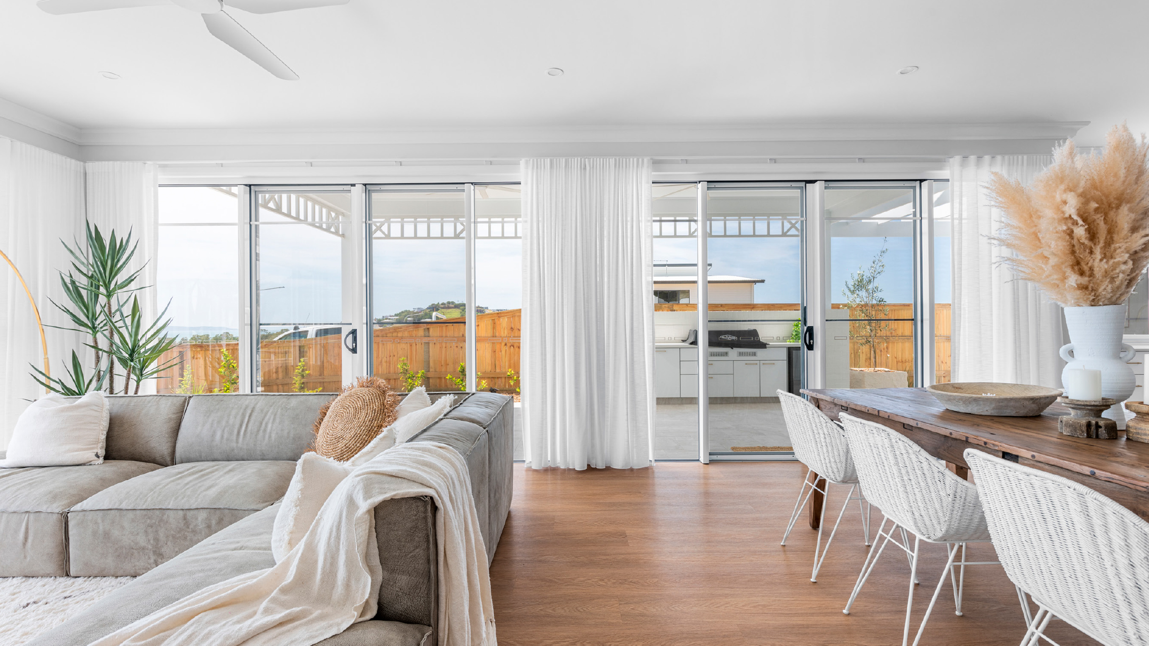 Two White External Sliding Doors in living room