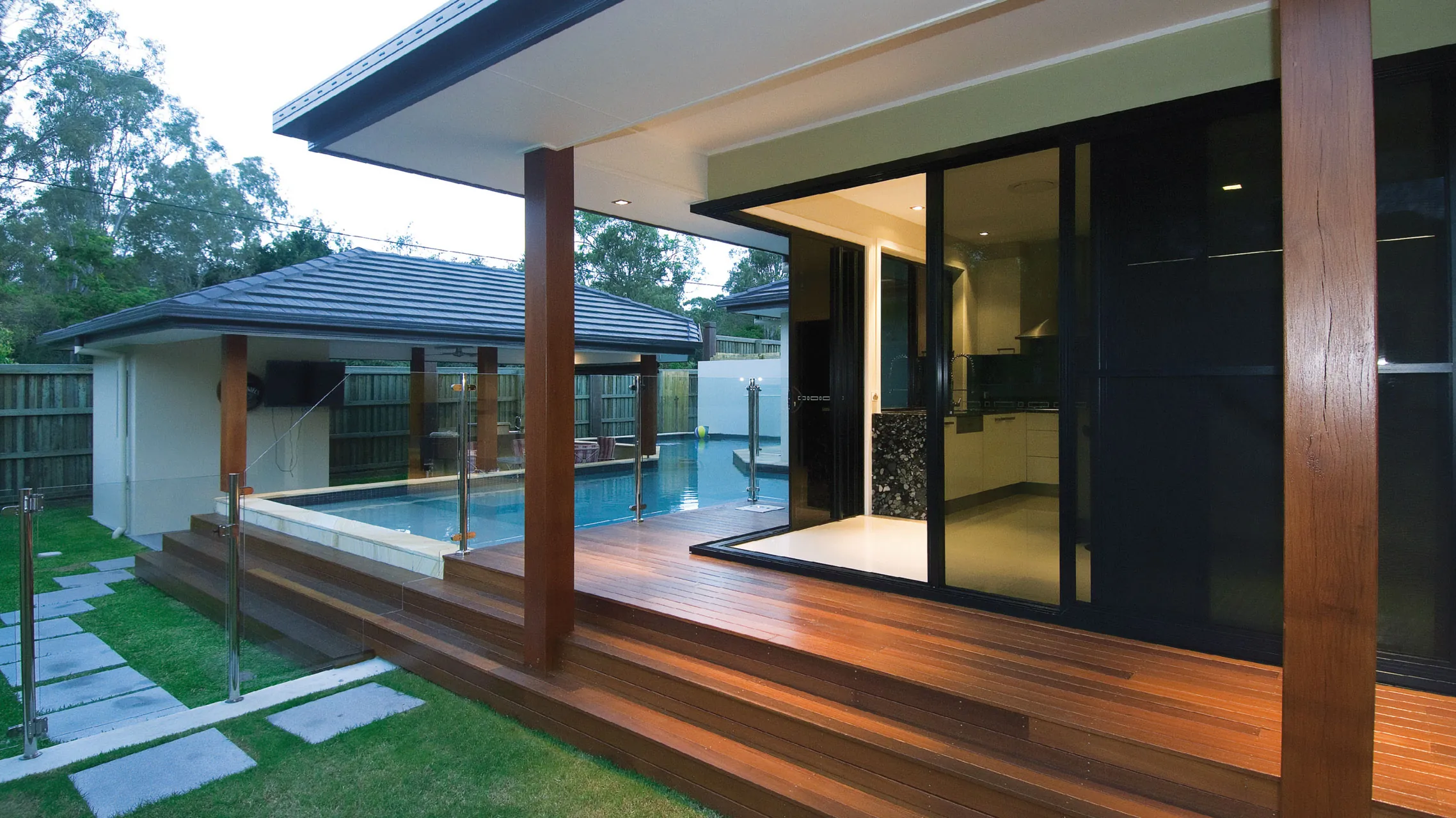 Black Aluminium Corner Sliding Doors with grey glass