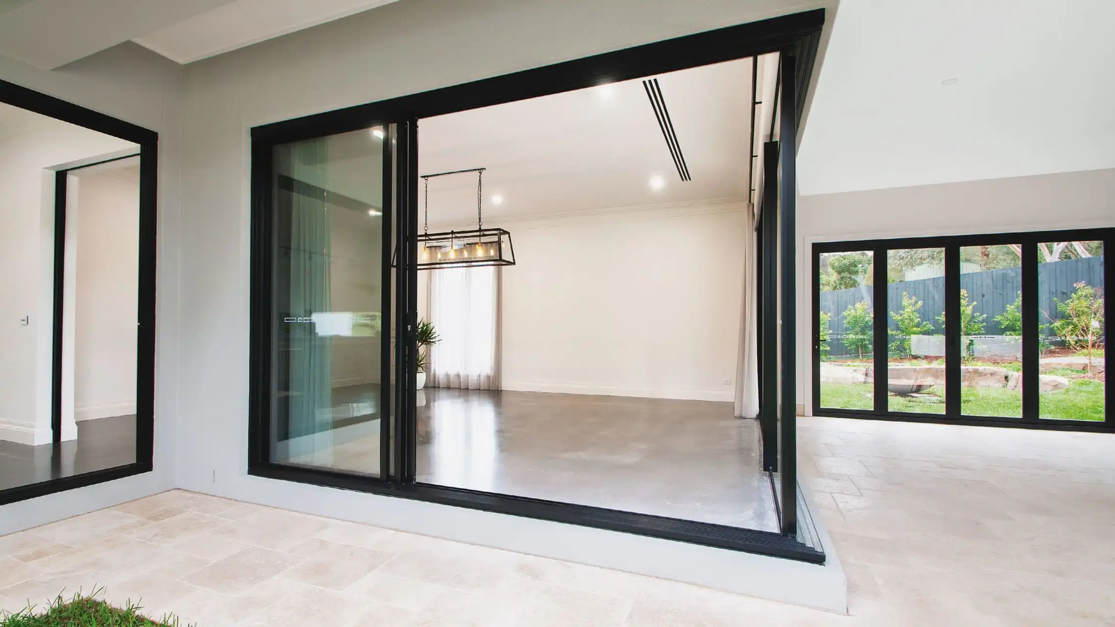 Black Aluminium Corner Sliding Doors