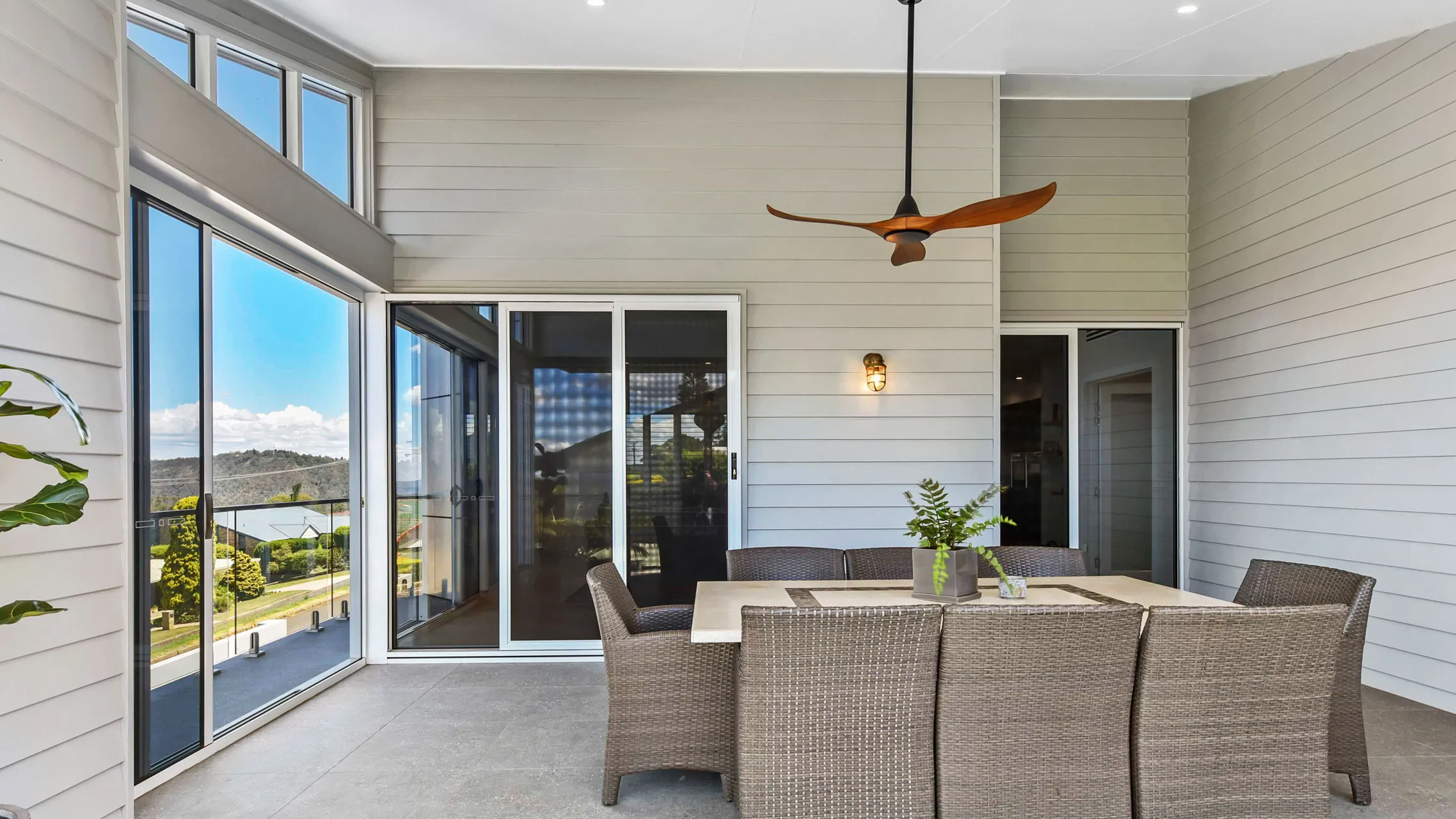 White Sliding Doors and Raked Window