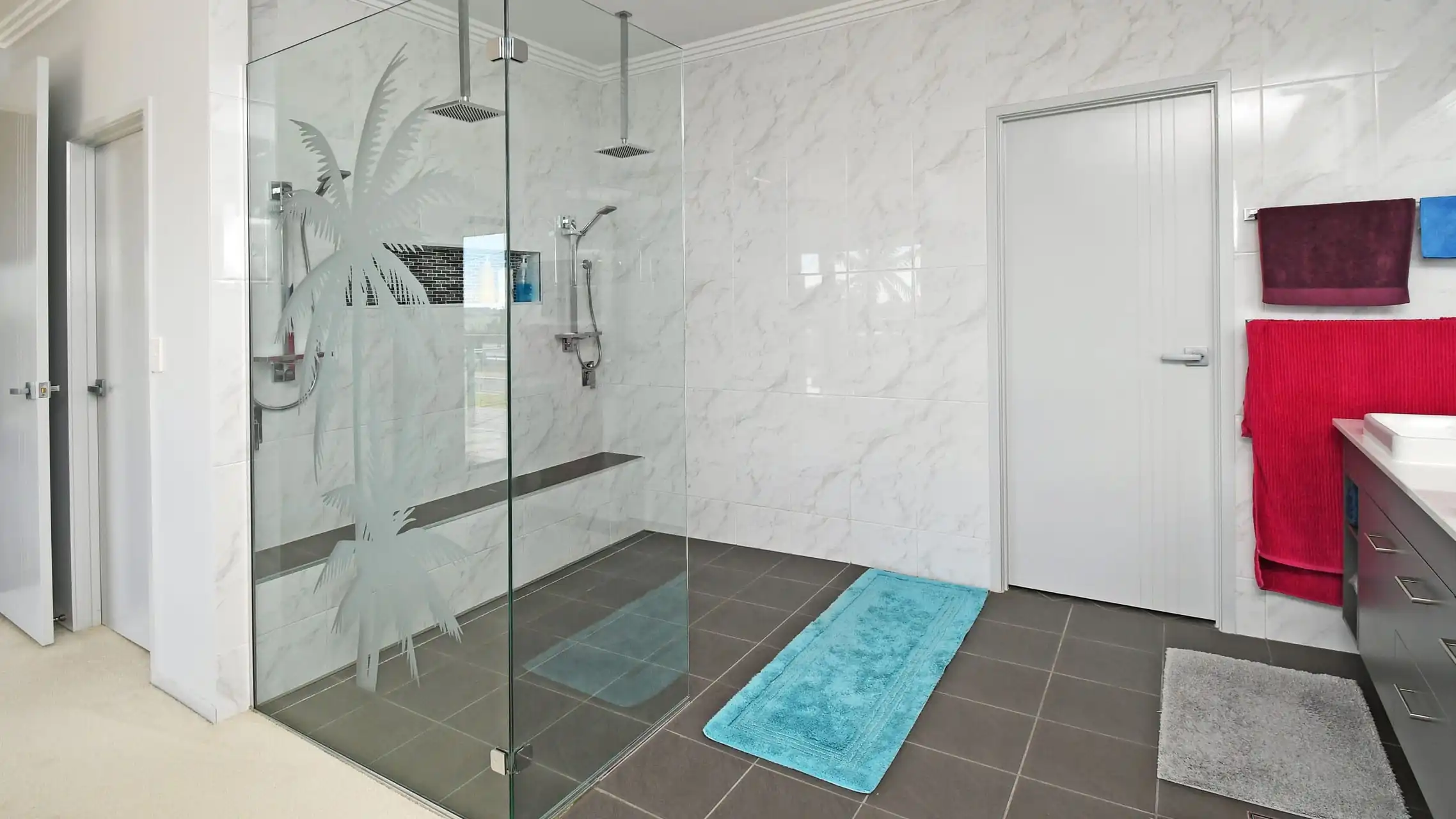 Fixed Frameless Showerscreen with image of trees